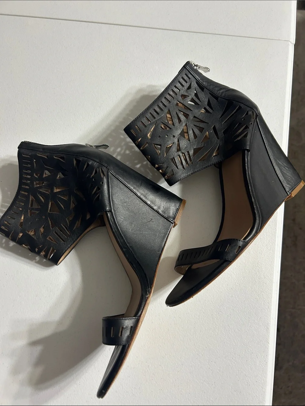 Nicole Miller Black Laser-Cut Wedge Sandals